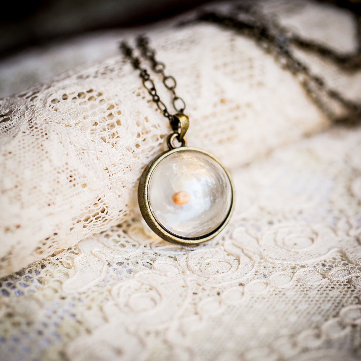 Floating mustard outlet seed necklace