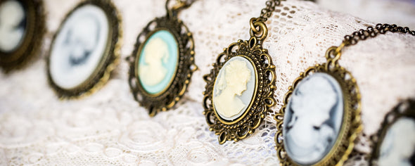 vintage resin cameo necklaces on lace background