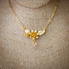 the evelyn lotus flower gold necklace