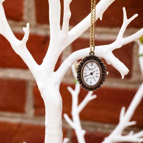 cameo pocket watch vintage necklace hanging on tree, watch view