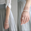 adjustable plum blossom bracelet bangle on white background