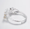 Plum Blossom Ring with sterling silver and 18k gold buds adjustable on a white background