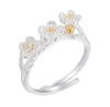 Plum Blossom Ring with sterling silver and 18k gold buds adjustable on a white background