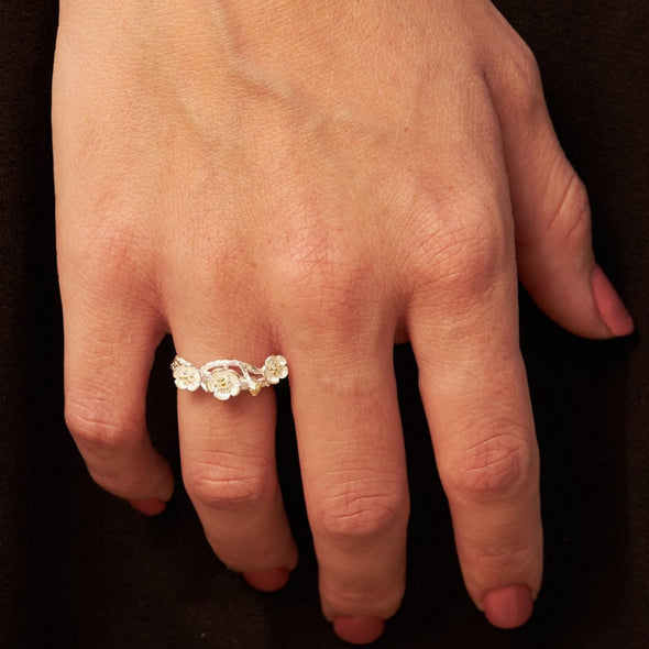 plum blossom ring and bracelet on model